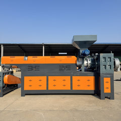 Pulverized material granulator with single screw feeder