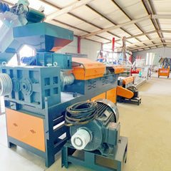 Pulverized material granulator with single screw feeder