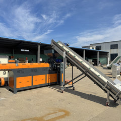Pulverized material granulator with single screw feeder