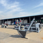 Pulverized material granulator with single screw feeder