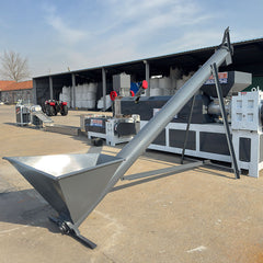 Pulverized material granulator with single screw feeder