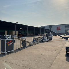 Pulverized material granulator with single screw feeder